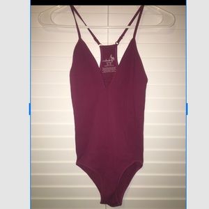 Free people body suit nwot!!